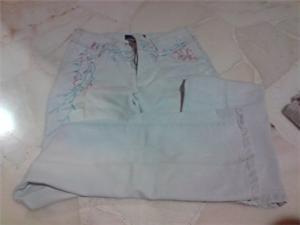 Light blue jeans with floral design