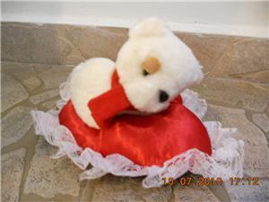 White Bear on Red Pillow