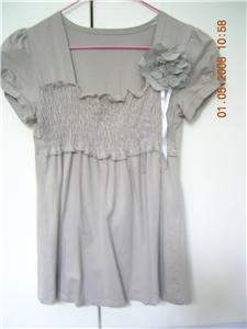 Light grey top with removable brooch
