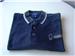 Used authentic Hammer logo polo shirt. pre-shrunk 100% cotton pique knit, Double stitched seams, 3 woodtone buttons, Contoured welt. Distinctive detailing on collar and cuffs for a professional appearance. 

Colour: Black