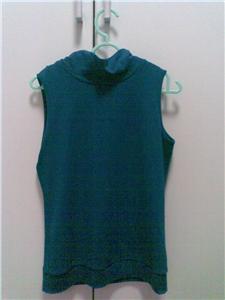 Turquoise Turtle Neck top BN