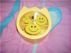 Yellow Happy face music box