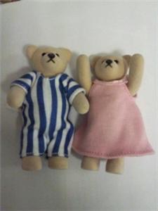 A pair of couple teddy bear bought from Mac