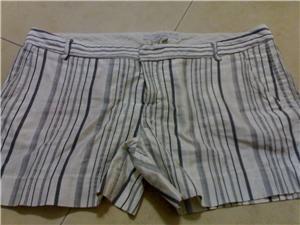 ZARA white shorts with strips.