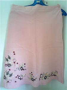 Pink skirt w flower at the bottom