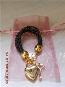 Bangle with heart shape lock design