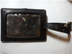 black luggage tag