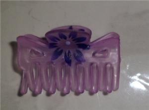 Small purple plastic hair clip