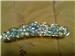 condition new.
hairclip. silver -blue metal. 